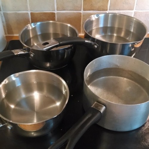 Boiling saucepans for a bath