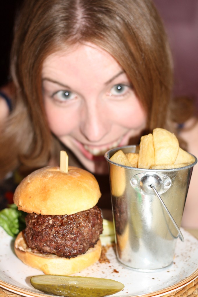 Hollie and her burger at The Dabbling Duck