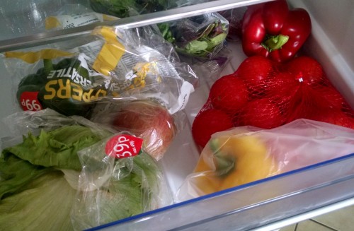 Salad items in the fridge