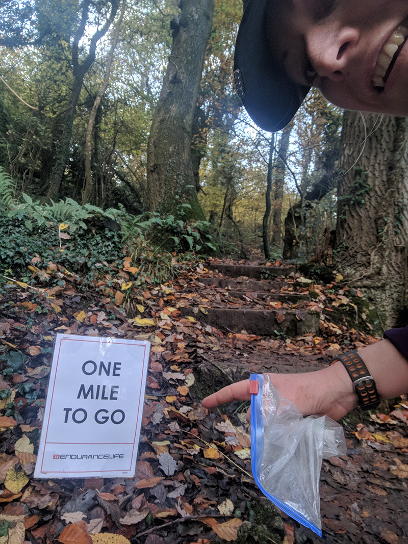 One mile to go sign at the EnduranceLife Gower Marathon